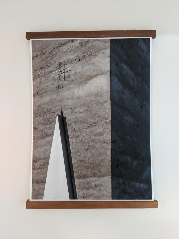 Studio Violett photograph study of the triangular door detail and textured rammed concrete threshold at Peter Zumthor's Bruder Klaus Field Chapel