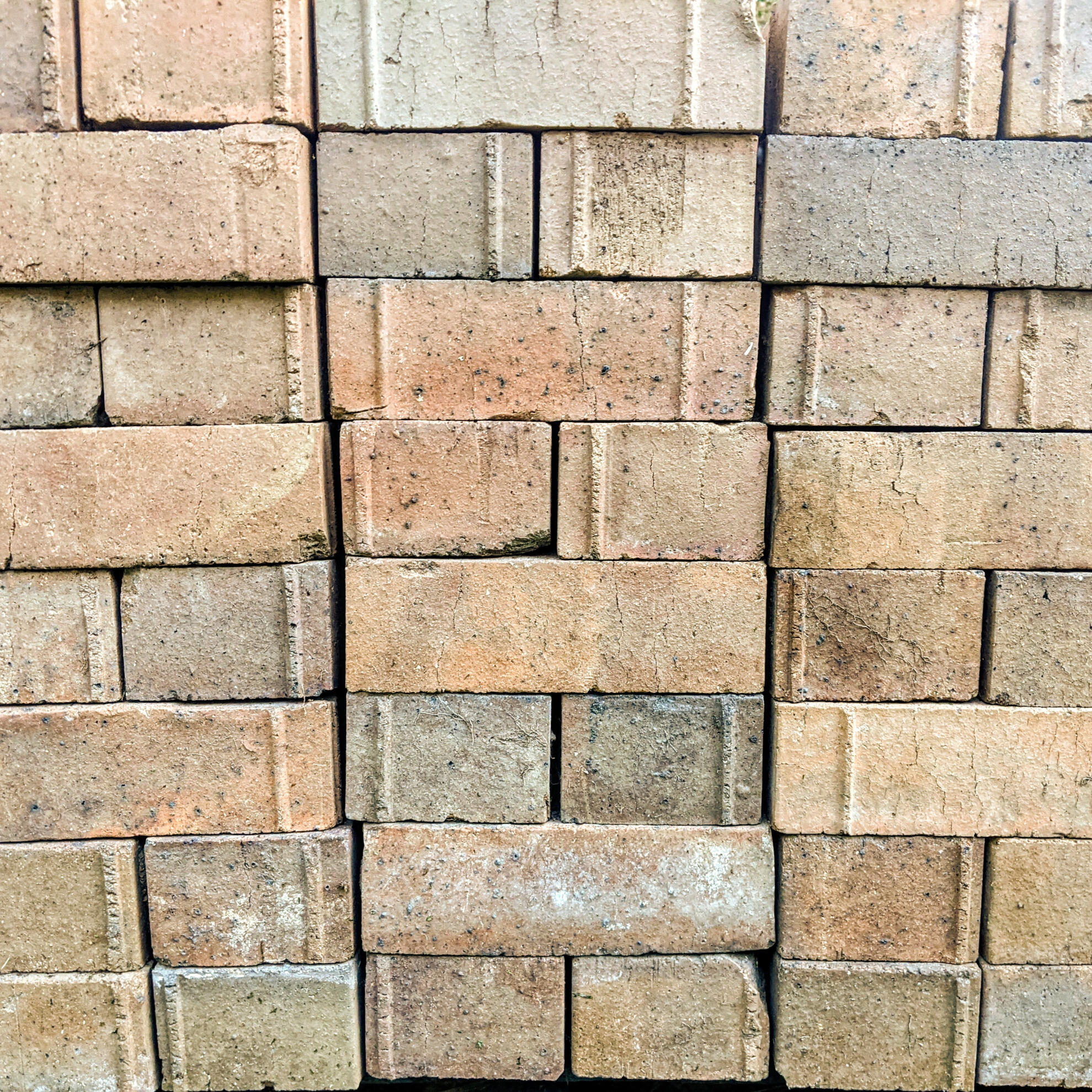 Recycled brick awaiting reuse Studio Violett Oxley Farmhouse recycled bricks awaiting reuse as stairs and garden elements highlighting sustainable craftsmanship